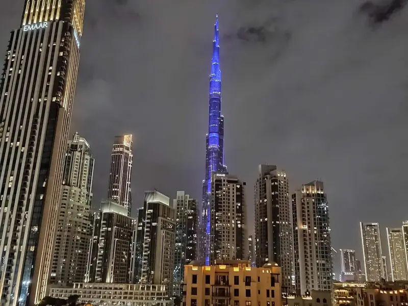 Burj Khalifa lit up at night, seen from the apartment